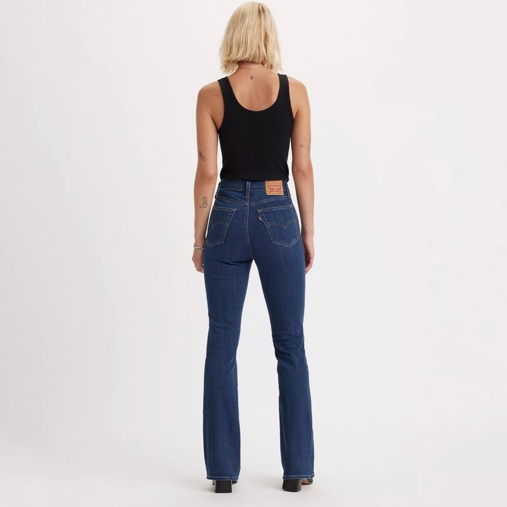 Levi’s high-rise 725 boot cut size 10 or 30/32, wash shown in picture, dark.